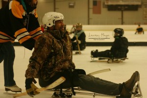 Jerry trying sled hockey for the first time